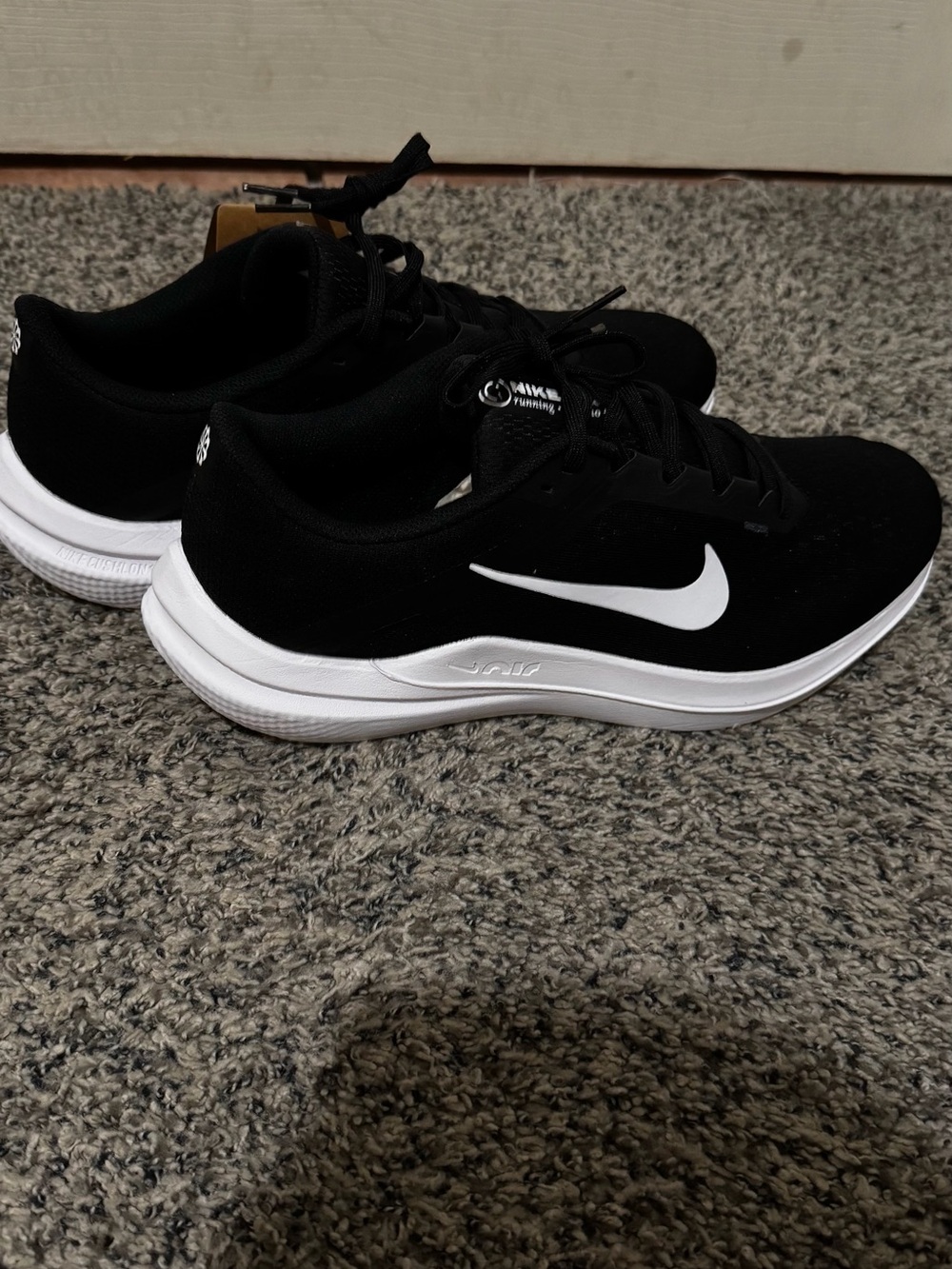 Nike Black with White Swoosh Lightweight Trainers
